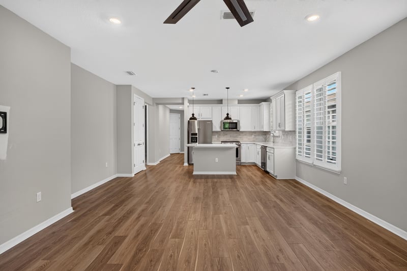 Kitchen island open to the living room at 171 Oyster Shell Ter, Nocatee, FL 32081