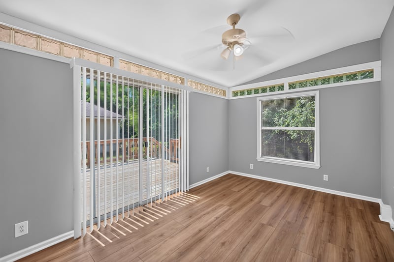 Sunroom with windows and vaulted ceiling at 9256 Dale View Ln W, Jacksonville, FL 32225