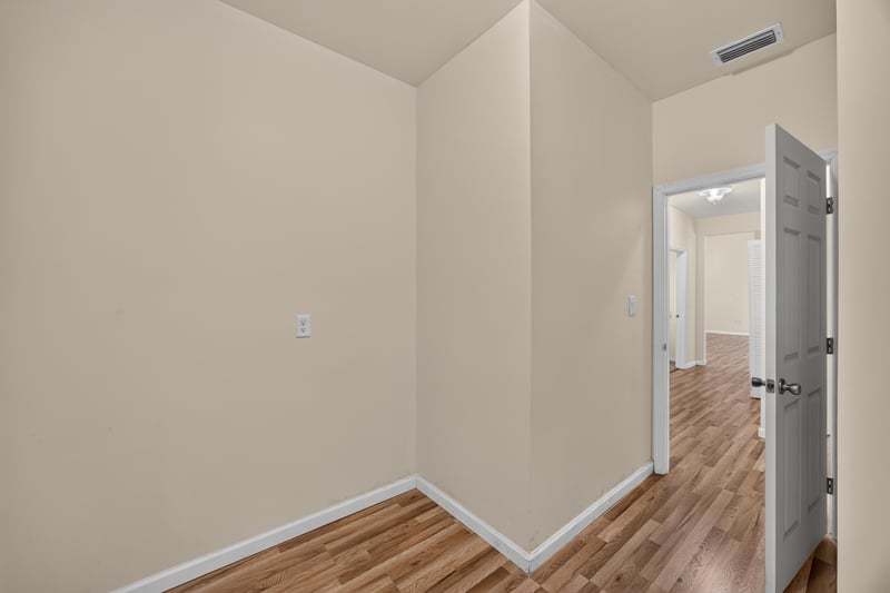 Room with doorway view to adjoining space at 1012 Fruit Cove Rd, Jacksonville, FL 32259