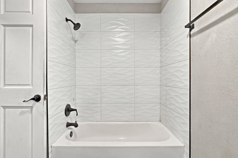Bathroom with shower and tub combo at 357 Dillon Dr, Orange Park, FL