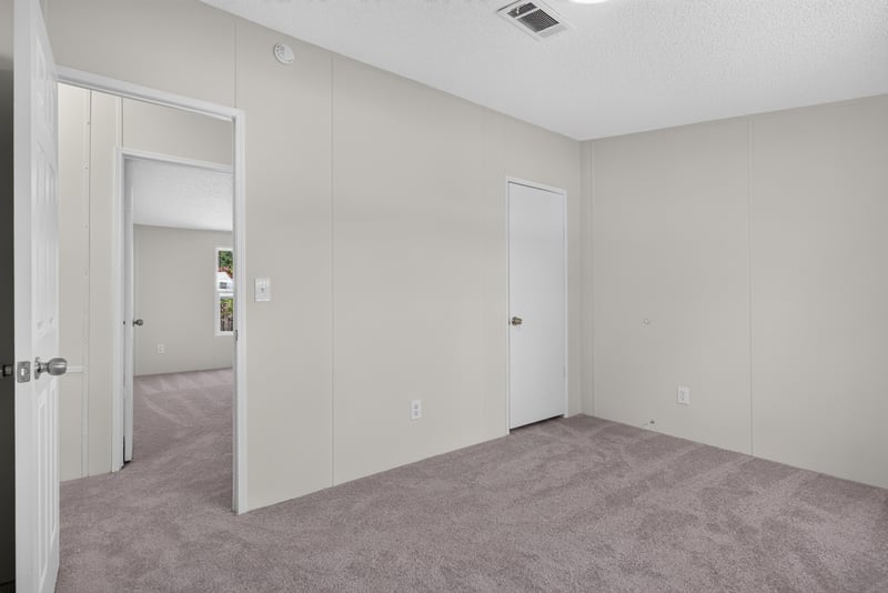 Bedroom with closet, unfurnished at 7603 Coach Park Dr, Jacksonville, FL 32244