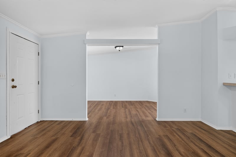 Open living space leading to hallway at 3215 Robin Ln, Middleburg, FL