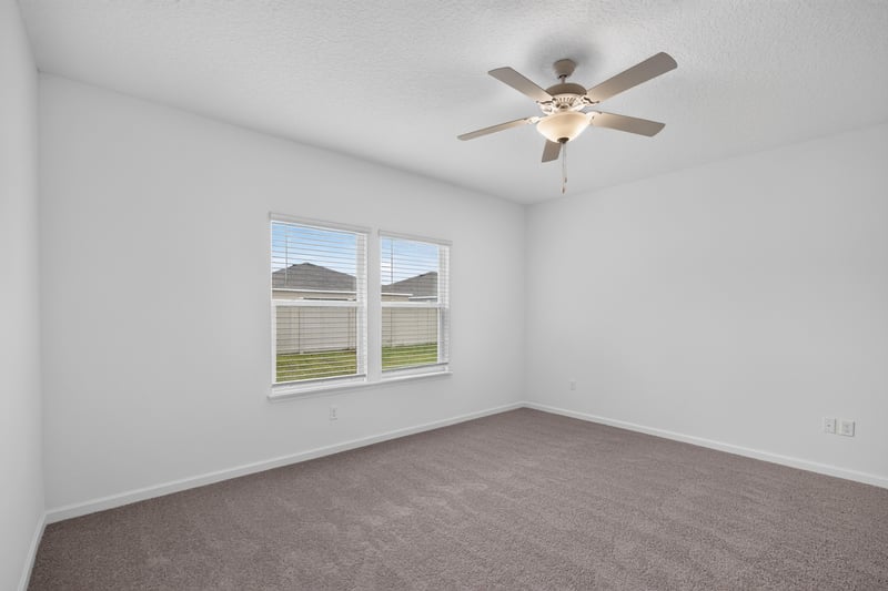 Bedroom with window view at 9905 Ansley Lake Dr, Jacksonville, FL