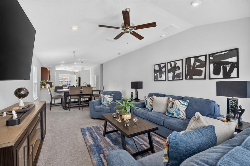 Living room view with framed wall art at 9846 Olivia St, Jacksonville, FL