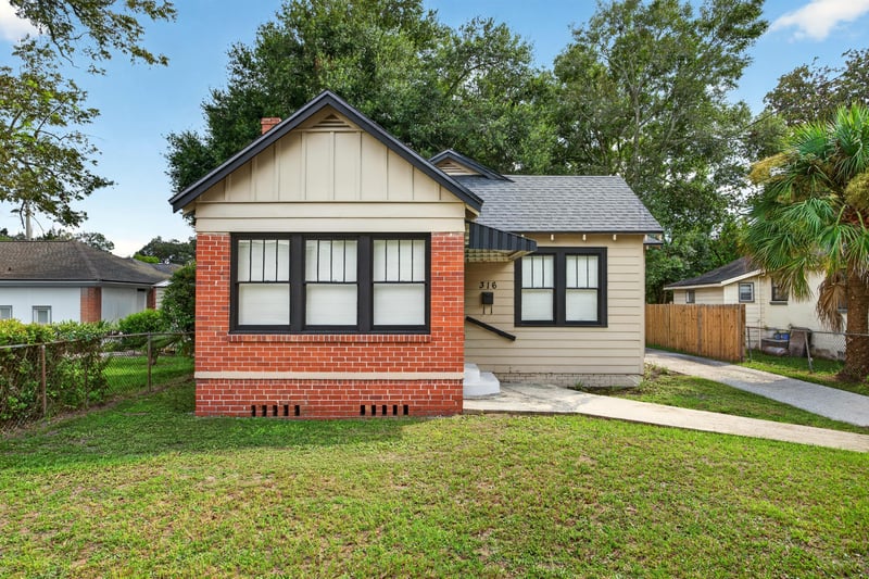 Front exterior view with yard and driveway at 316 W 41st St, Jacksonville, FL 32206