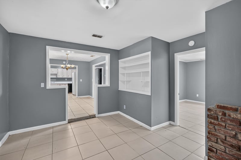 Open living space with tile floor and hallway view at 6745 Jack Horner Ln, Jacksonville, FL 32210