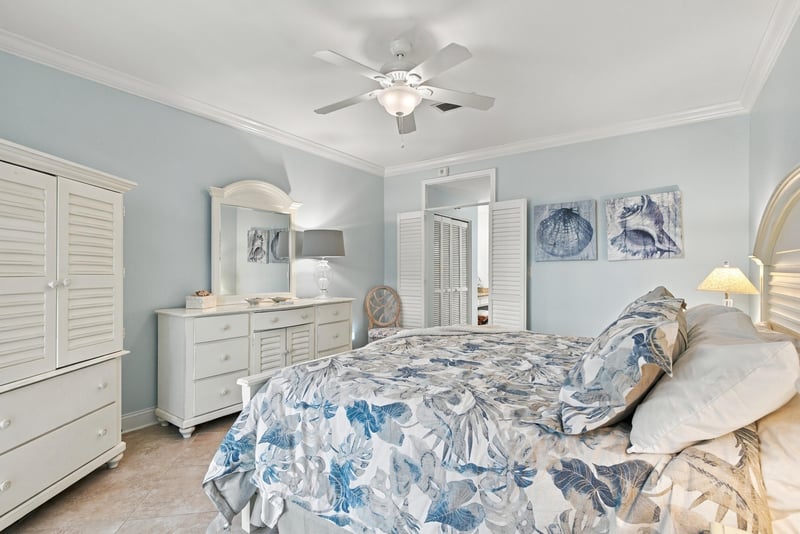 Bedroom with armoire and dresser at 805 Spinnakers Reach Dr, Ponte Vedra Beach, FL 32082
