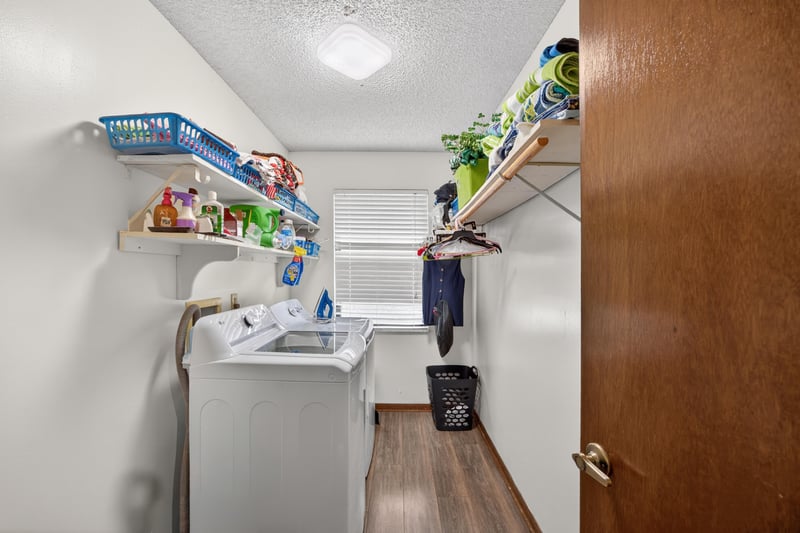 Laundry area with shelving and window at 981 Marble Ridge Dr, Orange Park, FL 32065
