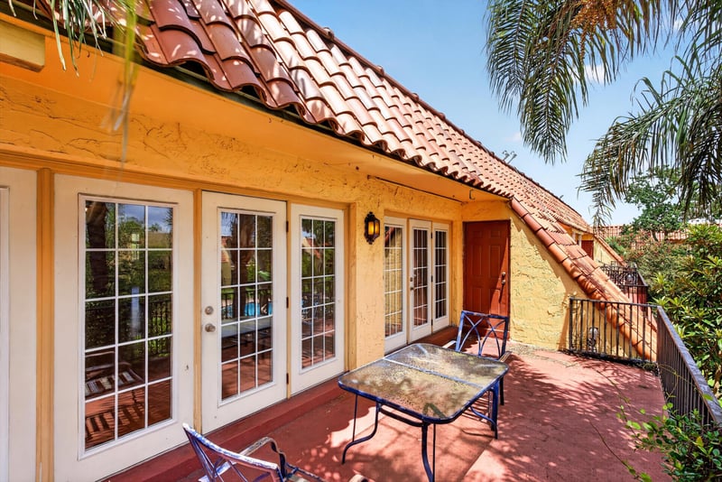 Patio with French doors and table at 3866 Campenero Ct unit 6, Jacksonville, FL 32217