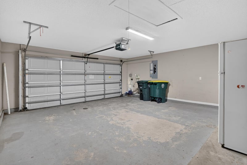 Garage interior with overhead door at 12949 Chets Creek Dr S, Jacksonville, FL 32224