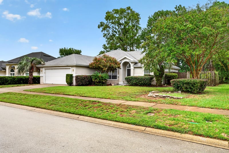 Front exterior view from the street at 12949 Chets Creek Dr S, Jacksonville, FL 32224
