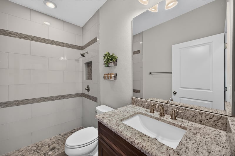 Bathroom with tiled walk-in shower at 53 Lumen Ct, St. Augustine, FL 32095