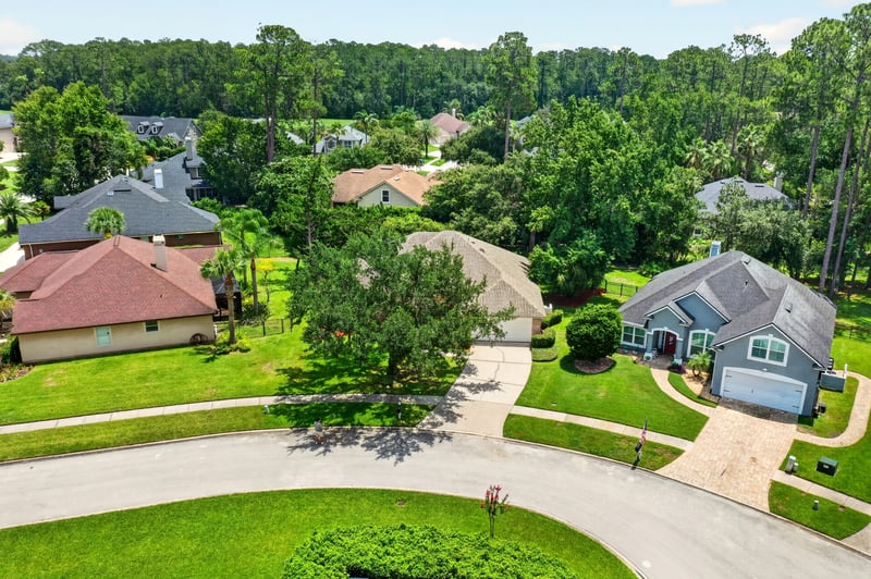 Aerial view of the home and street at 1955 GUARDED Way, Fleming Island, FL 32003