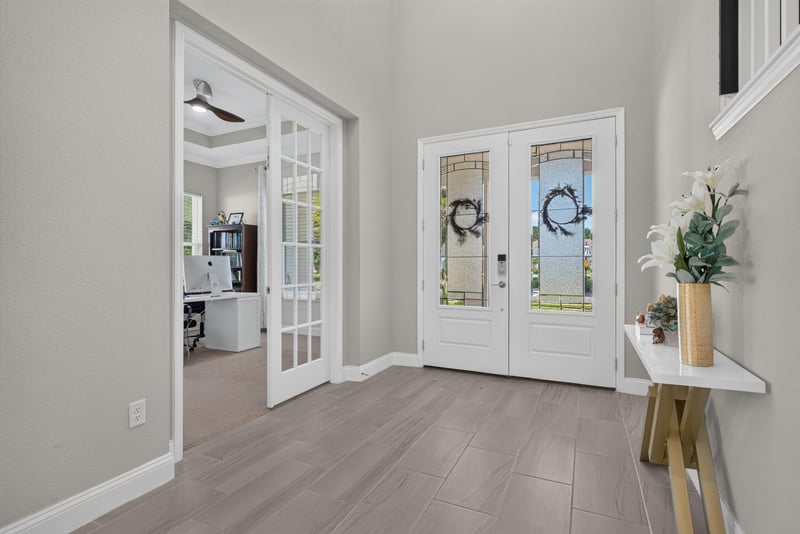 Home office with French doors at 22 Azura Point