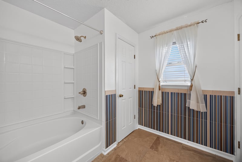 Primary bathroom shower stall at 2282 Justin Lake Dr, Jacksonville, FL