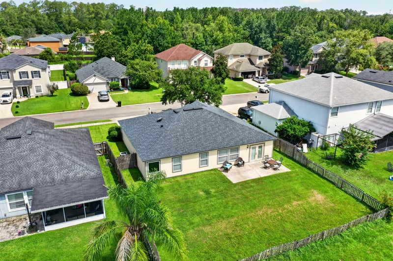 Aerial view of rooftops and tree line in Middleburg