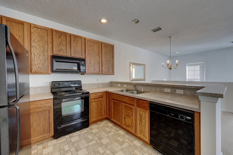 Kitchen at 12301 Kernan Forest Blvd unit 2106, Jacksonville, FL 32225