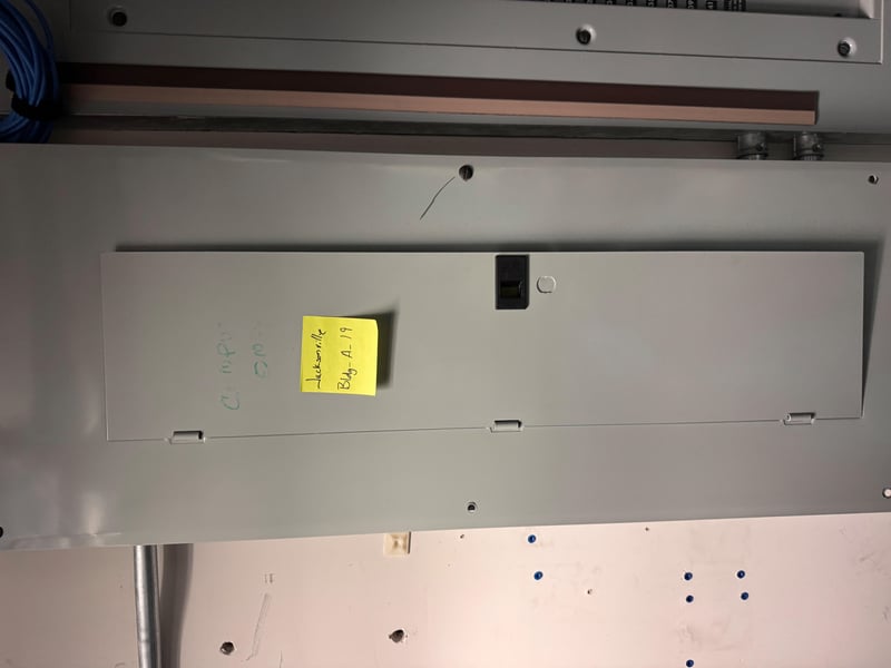 Panel cover with handwritten sticky note label at 11700 New Kings Rd, Jacksonville, FL 32219