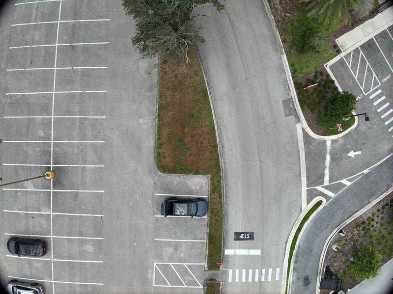 Aerial view of parking lot and landscaped strip at 9406 Atlantic Blvd, Jacksonville, FL 32225