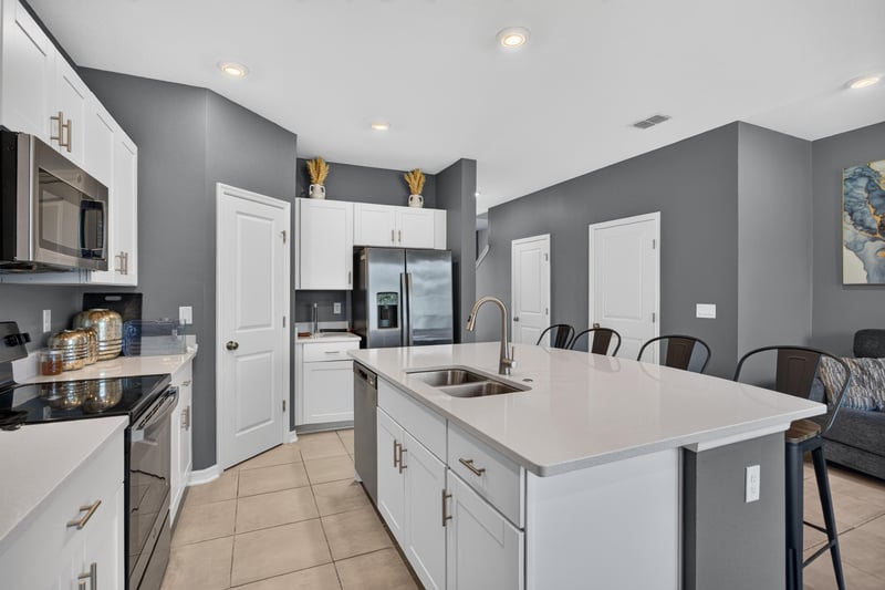 Kitchen sink and island with pendant lighting at 339 Anthony Dr, Jacksonville, FL