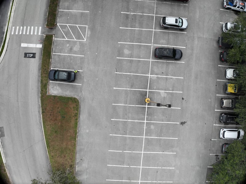 Aerial view of parking lot and light pole at 9406 Atlantic Blvd, Jacksonville, FL 32225