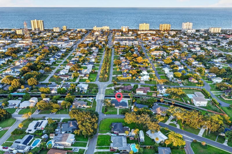 Aerial view toward the ocean and beach grid in Jacksonville Beach, FL