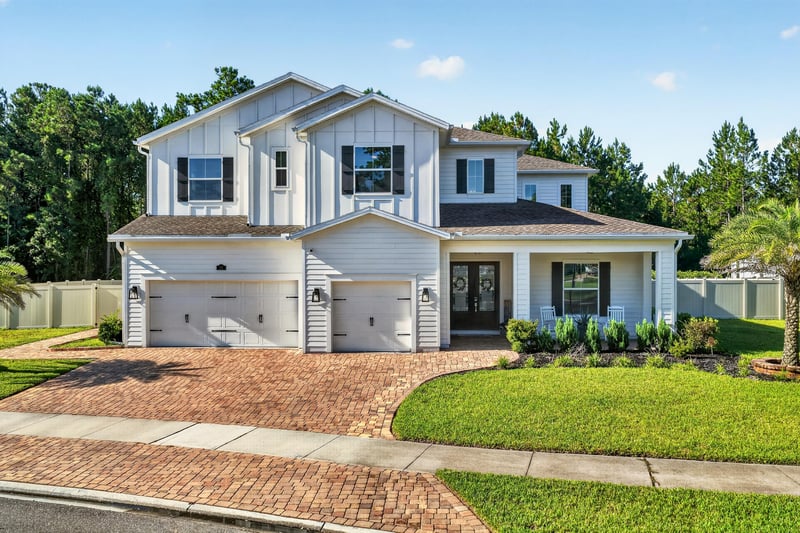 Front exterior in daylight with driveway at 22 Azura Point