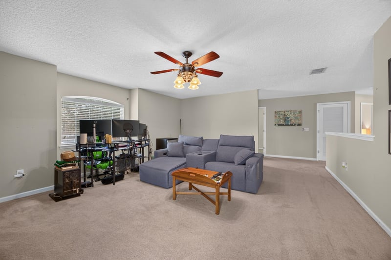Bonus room furnished with gaming setup at 3660 Middlebrook Dr, Orange Park, FL 32065