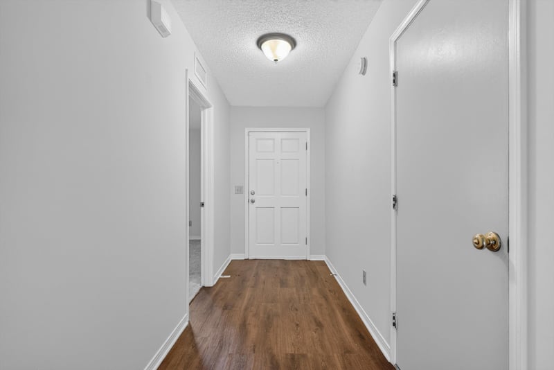 Hallway leading to front door at 1445 Classic Oak Rd W, Jacksonville, FL