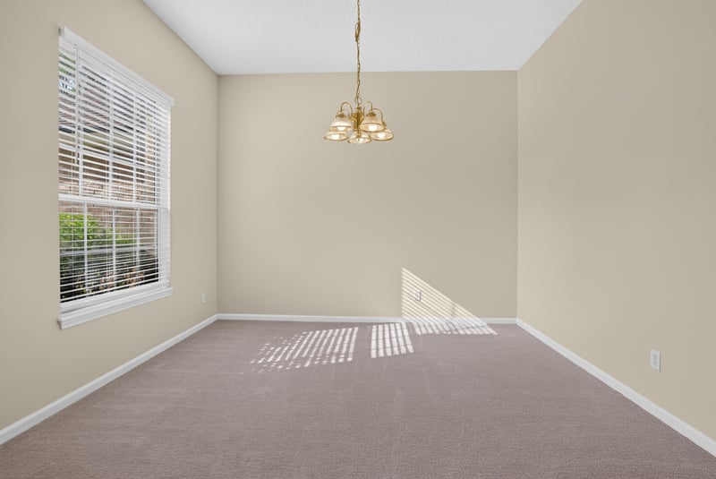 Living room with carpet and natural light at 299 John's Creek Pkwy, St. Augustine, FL 32092