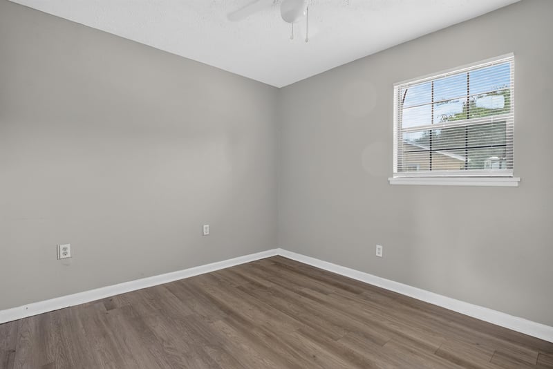Laundry nook with washer and back door at 255 Woodside Dr, Orange Park, FL 32073