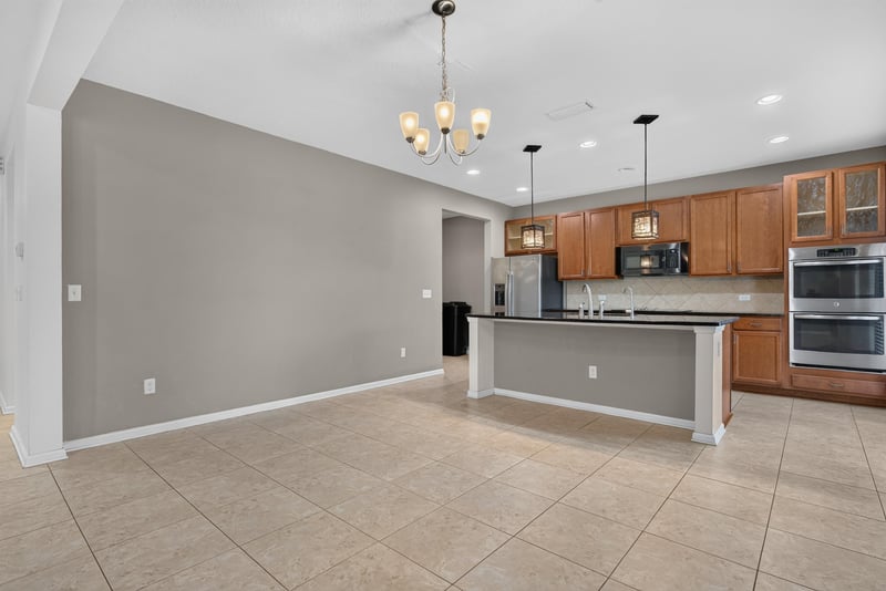 Kitchen with center island and pendant lighting at 263 Gilmore Ln, Orange Park, FL 32065