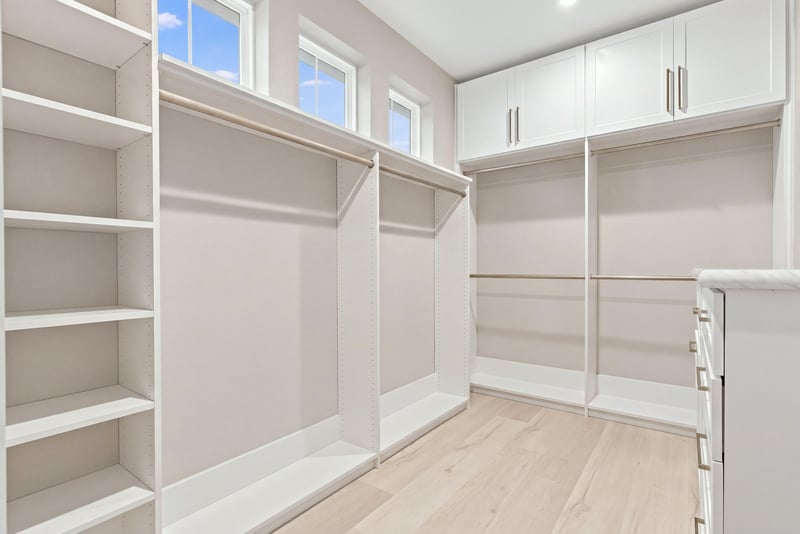Walk-in closet with built-in shelving at 3921 Spyglass Hill Ln