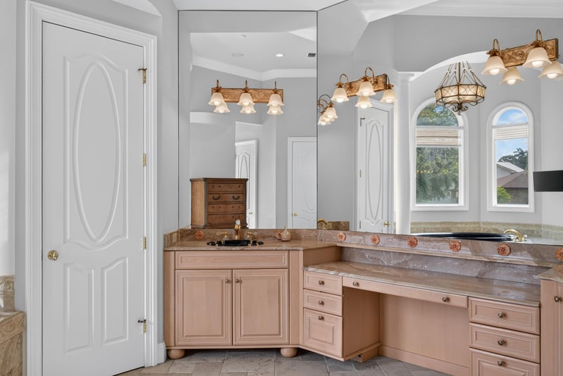 Primary bath vanity with arched window at 344 Broward Rd, Jacksonville, FL