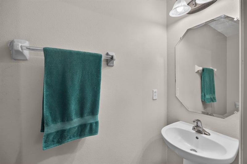Bathroom with towel bar and mirror at 7723 Playschool Ln, Jacksonville, FL