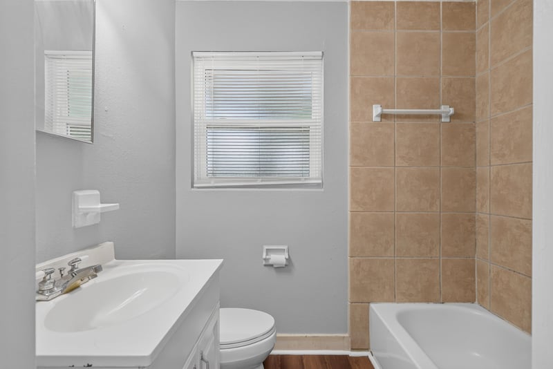 Bathroom with sink, toilet and tub at 1928 Montmarte Dr, Jacksonville, FL 32210