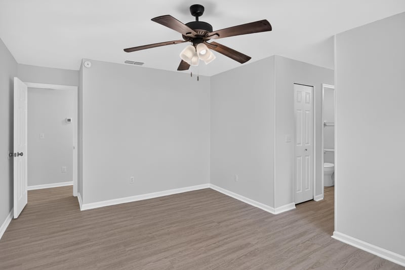 Bedroom with closet doors at 3801 Crown Point Rd unit 2061, Jacksonville, FL 32257