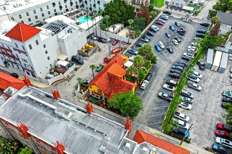 Aerial view of the property and adjacent parking lot in St. Augustine, FL
