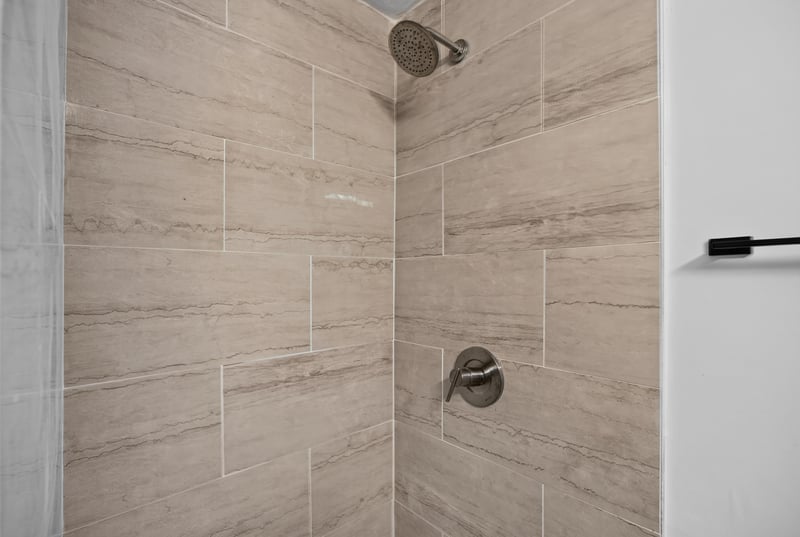 Tiled shower detail at 4951 Halls Dr