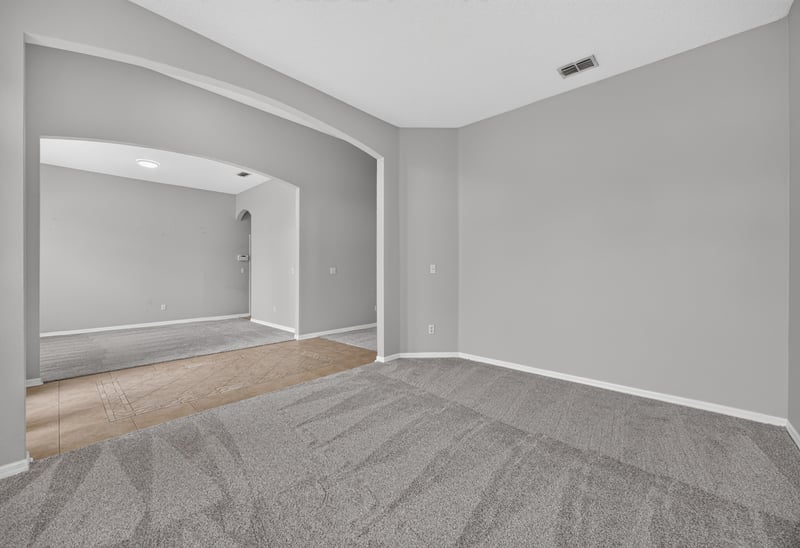Living room with vaulted ceiling at 635 Wakeview Dr, Orange Park, FL 32065