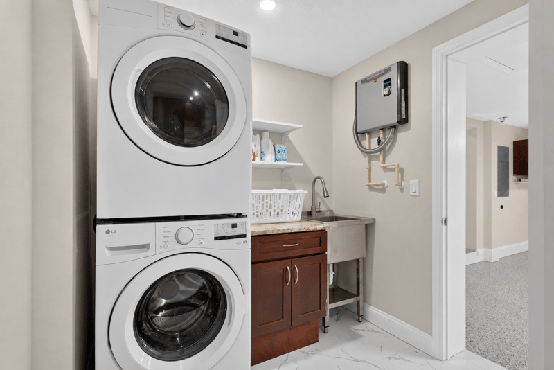 Laundry area with utility sink at 1525 8th St N, Jacksonville Beach, FL
