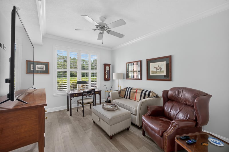 Den with desk and upholstered chairs at 10435 Mid Town Pkwy unit 135, Jacksonville, FL 32246