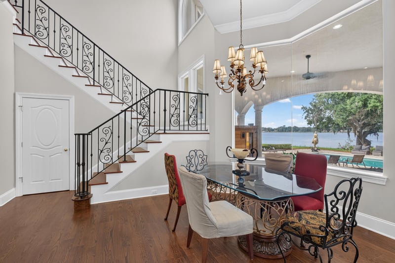 Staircase landing with wrought iron railing and water view at 344 Broward Rd, Jacksonville, FL