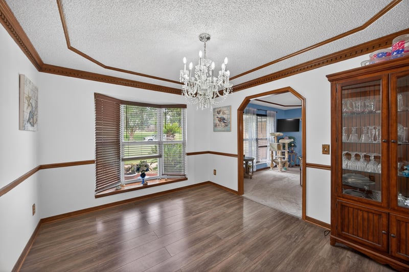 Dining room with chandelier and wood flooring at 981 Marble Ridge Dr, Orange Park, FL 32065
