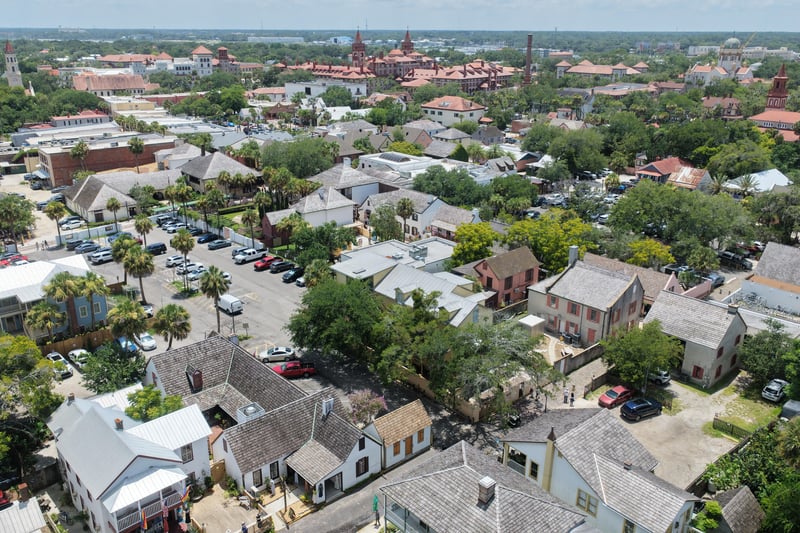 Aerial view of the historic district streets and surrounding rooftops in St. Augustine, FL