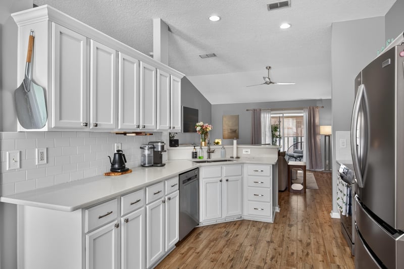 Kitchen opening toward dining area at 12825 Kelsey Island Dr, Jacksonville, FL 32224