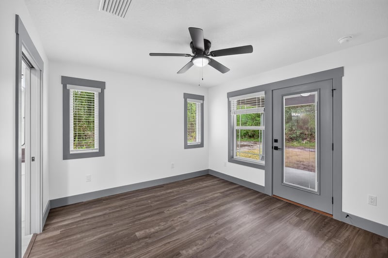 Bedroom with french doors, unfurnished at 4800 Acacia St, Middleburg, FL 32068