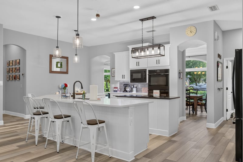 Kitchen island with pendant lighting and bar seating at 2304 Spring Hill Ct, Orange Park, FL