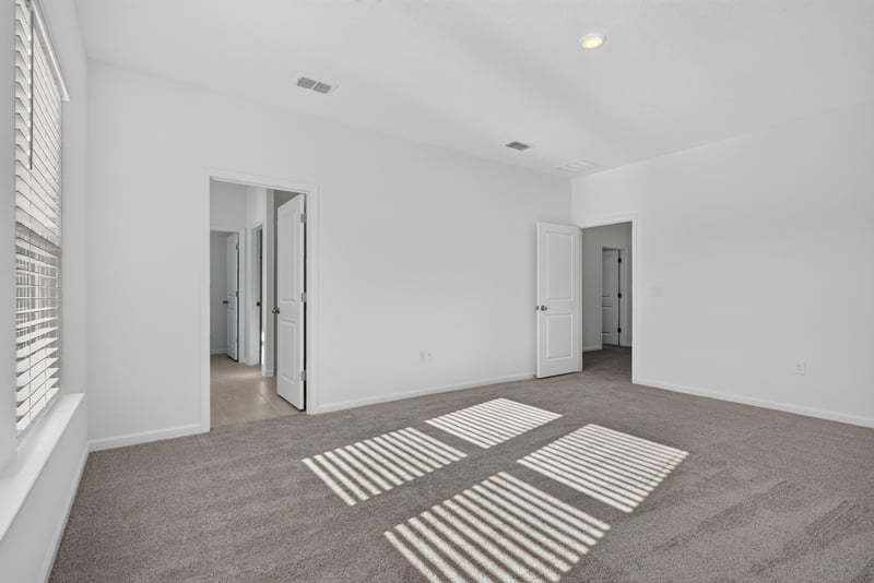 Empty carpeted room with window at 269 Bluegrass Wy, St. Augustine, FL 32092
