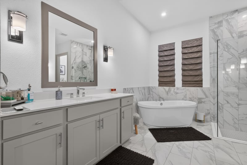Primary bathroom vanity with framed mirror at 785 Back Creek Dr, St. Augustine, FL 32092
